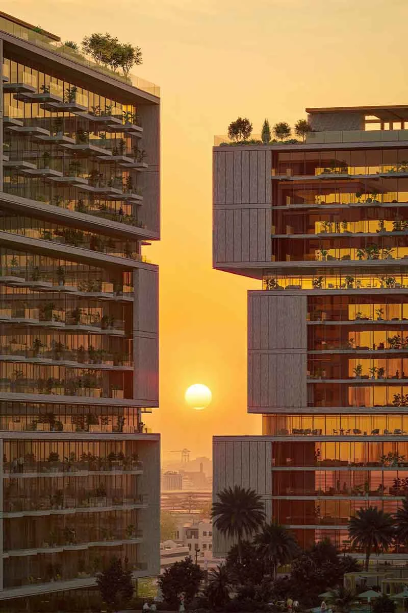 Sunset framed between the residential towers of RAW District